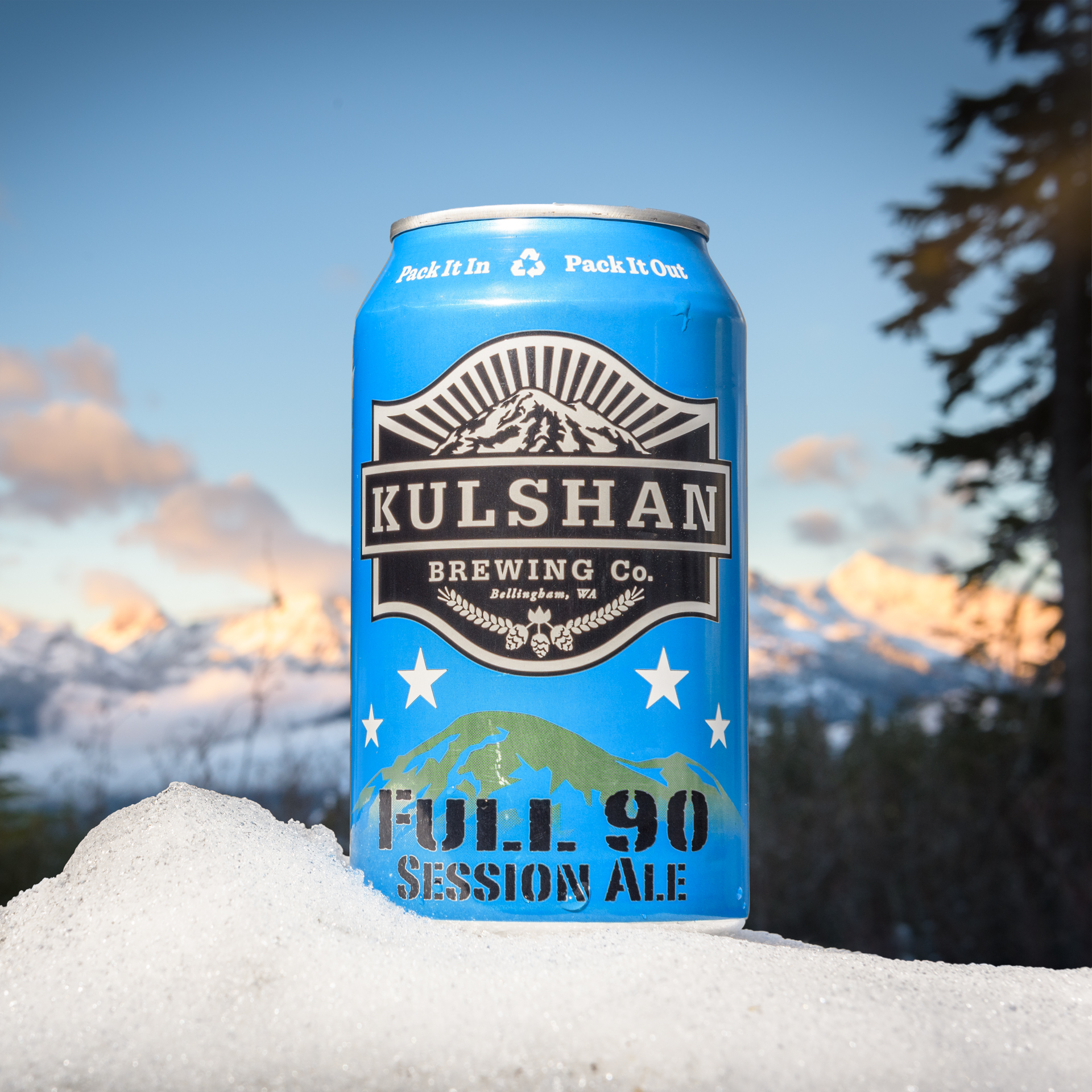 Kulshan beer can in the snow in the mountains baker